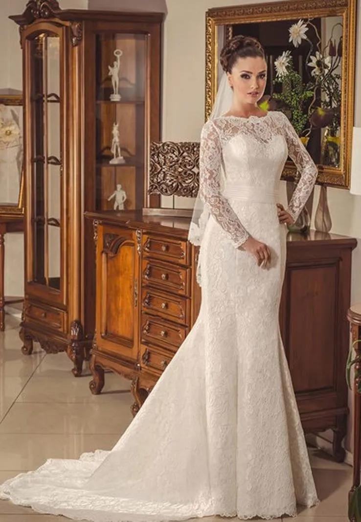 ---Very sensual and romantic wedding dress for winter wedding with semi-sheer long sleeves made entirely of lace with a draped s