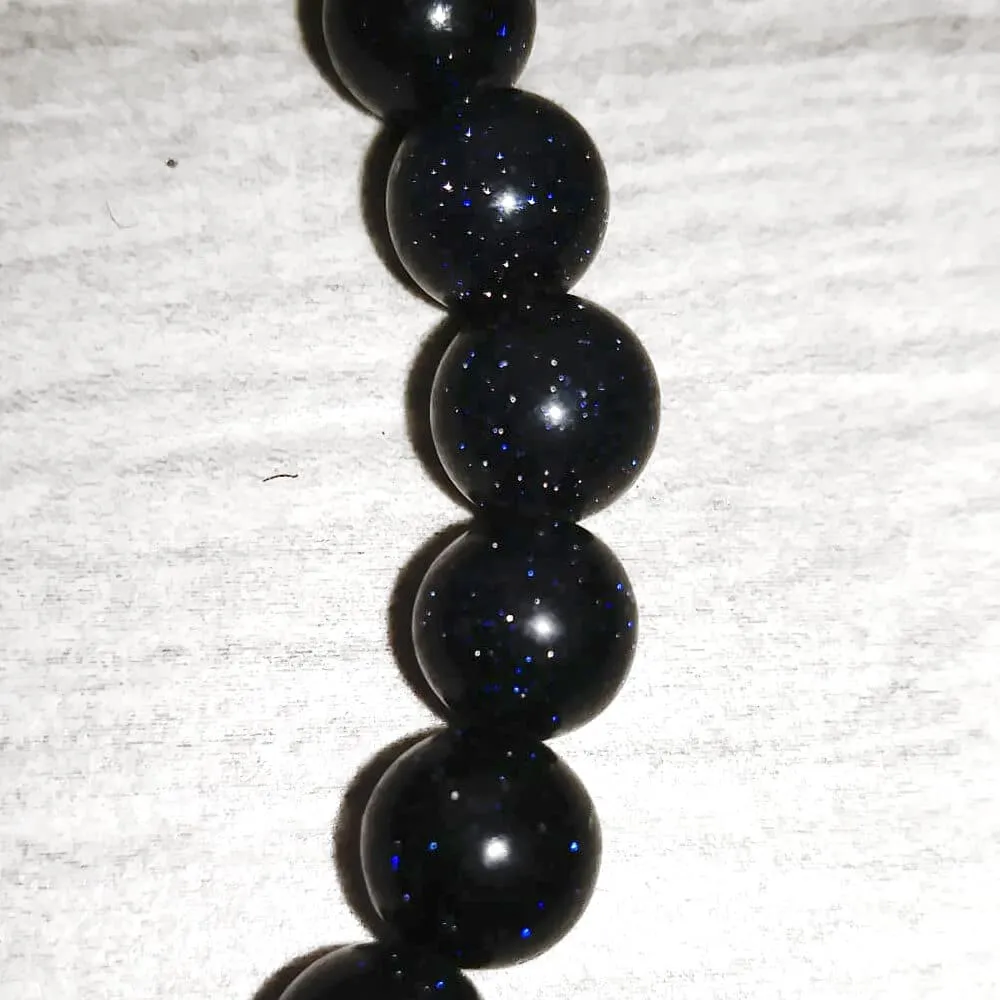 Braccialetto elastico con pietra del sole e luna pendente in argento 925