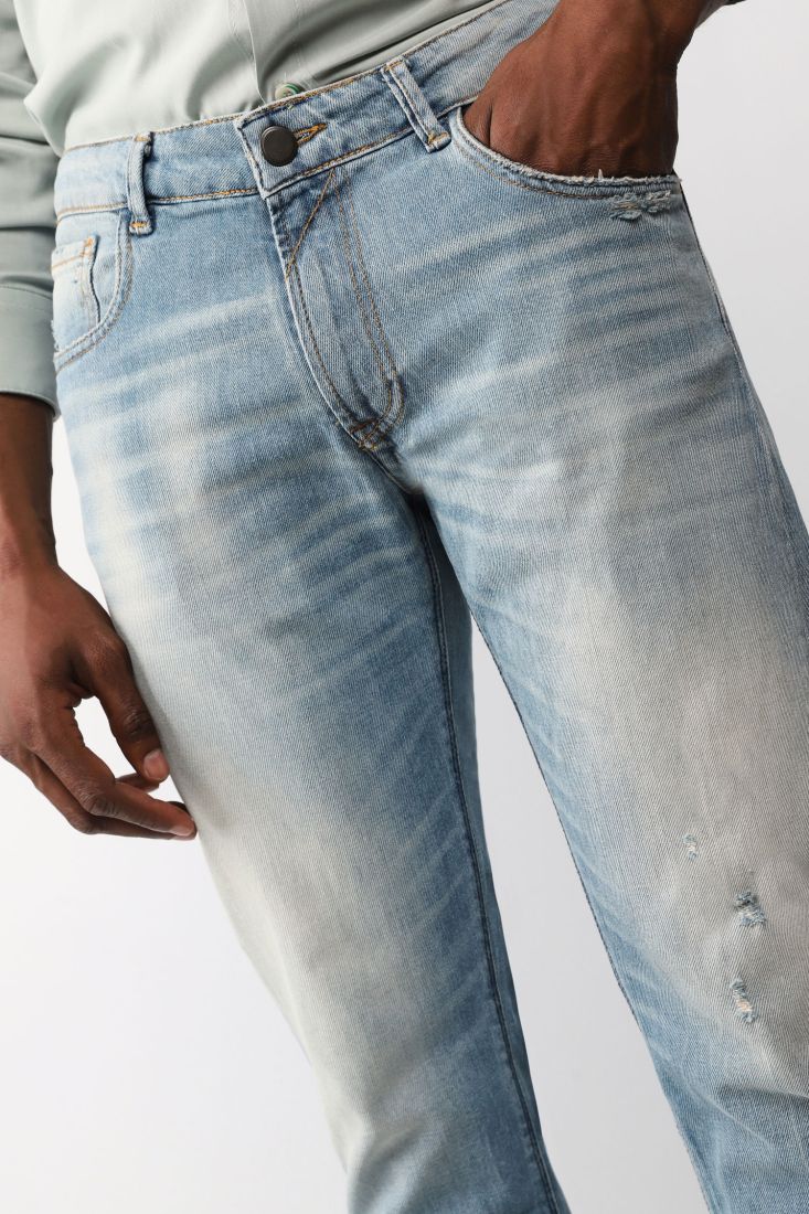 Jeans slim-fit effetto délavé con cinque tasche