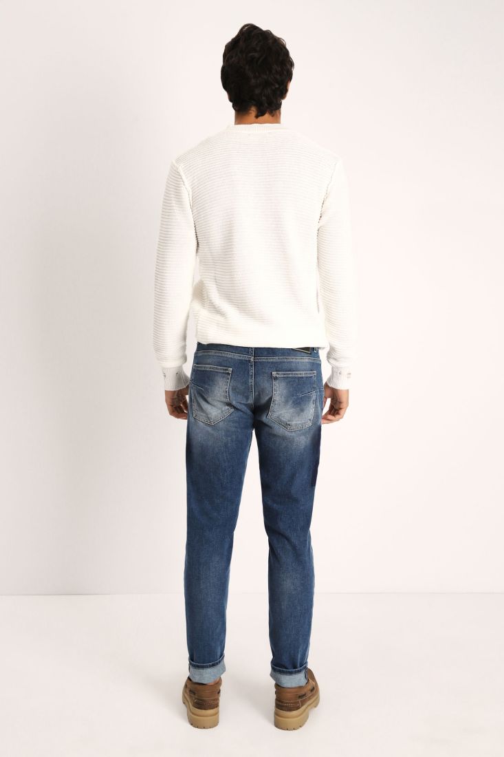 Jeans slim-fit effetto délavé con patch