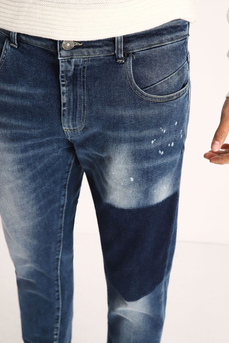 Jeans slim-fit effetto délavé con patch