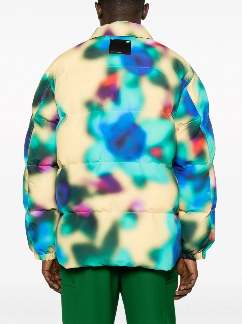 piumino con fantasia astratta multicolor