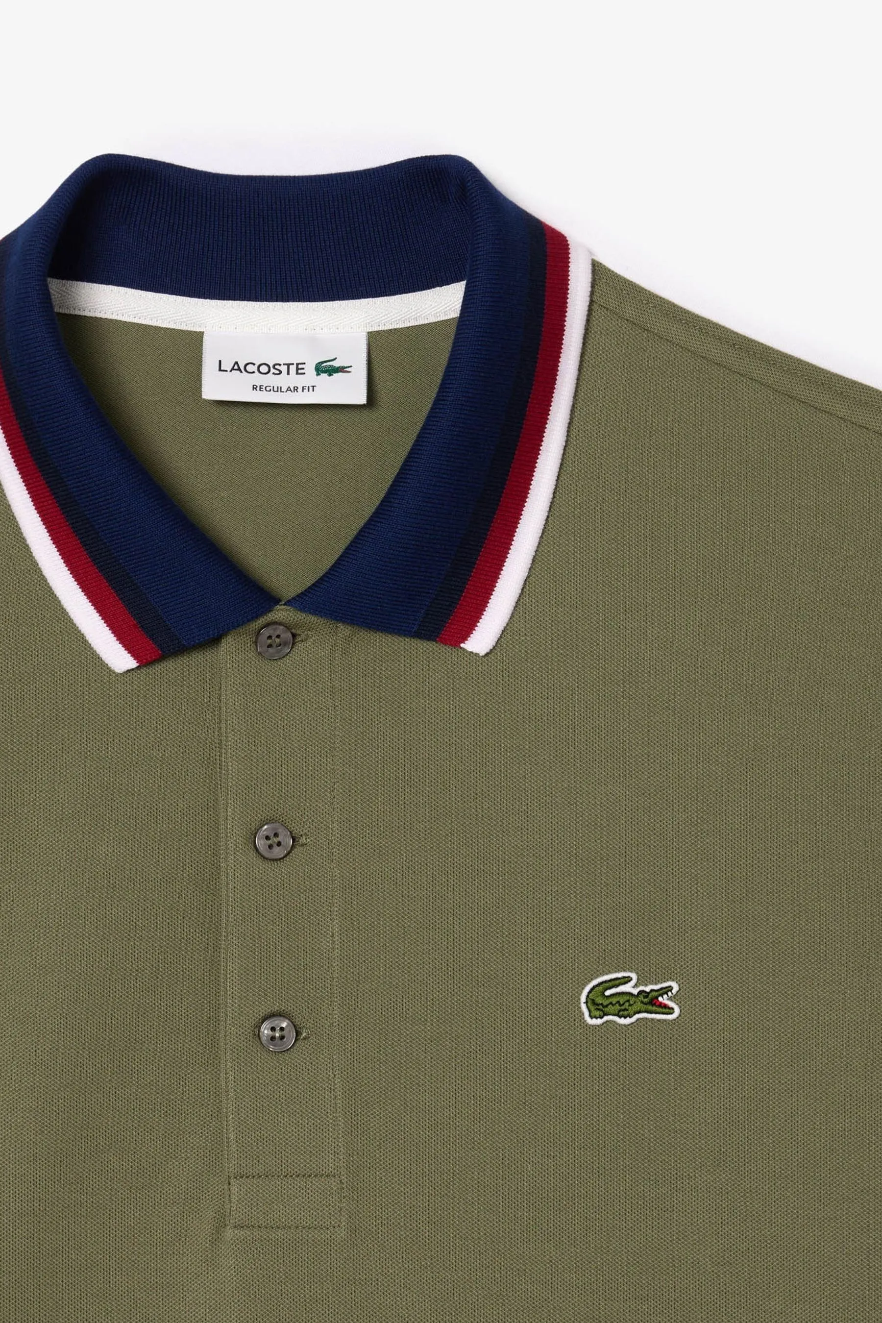 Polo Lacoste con colletto a contrasto    