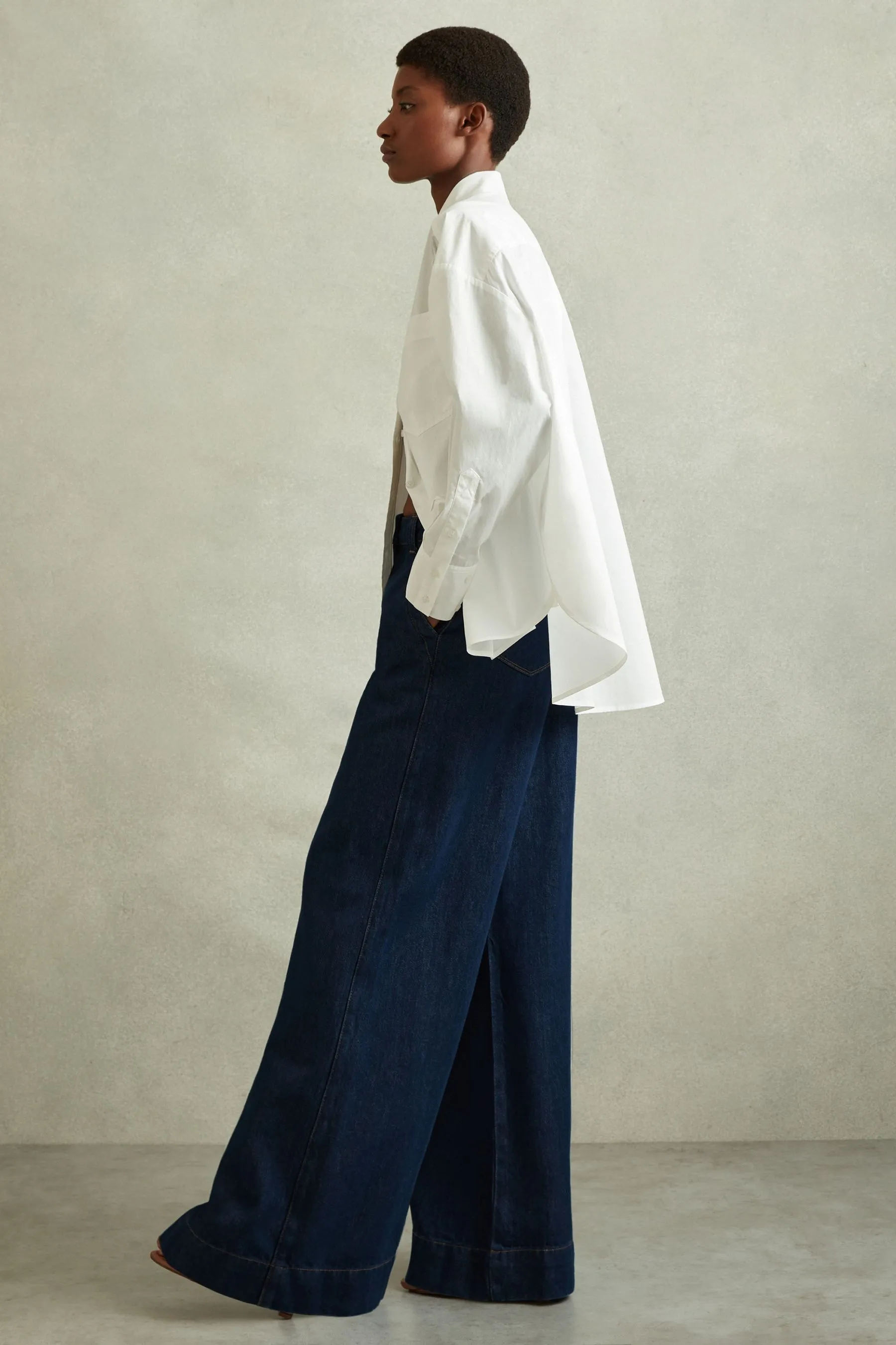 Reiss - Olivia - Jeans con fondo ampio e cuciture a contrasto    