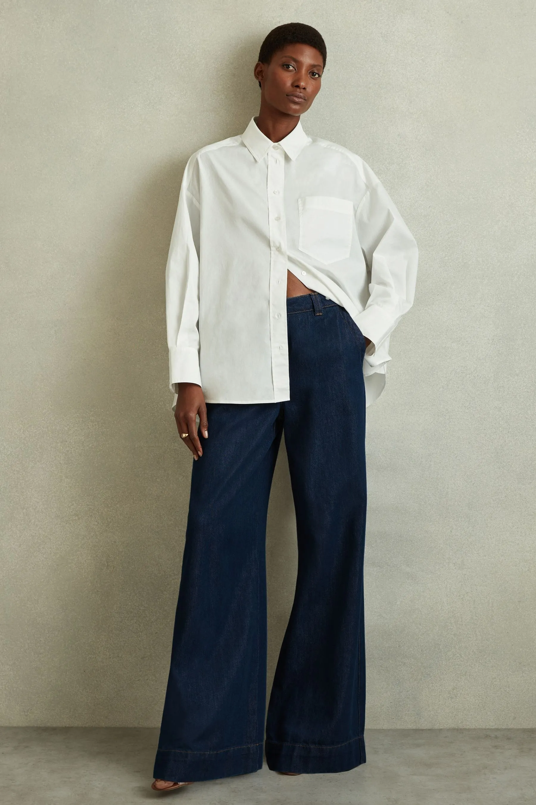Reiss - Olivia - Jeans con fondo ampio e cuciture a contrasto    